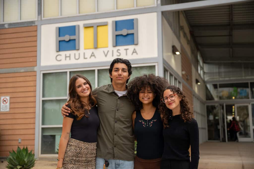 HTHCV graduating seniors take a moment to pose at the front entrance.