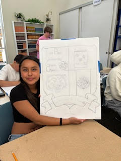 HTM student with artwork