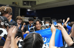 HTH robotics team members celebrate their victory.