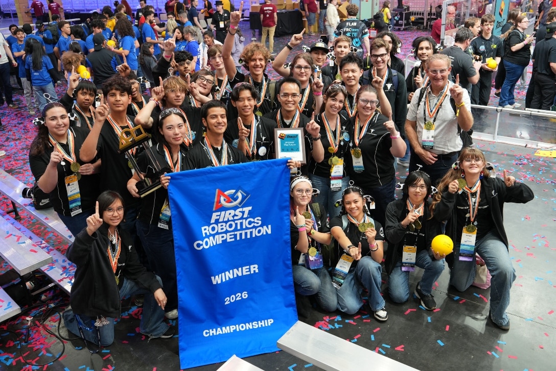 HTH San Diego's championship robotics team poses for a photo.